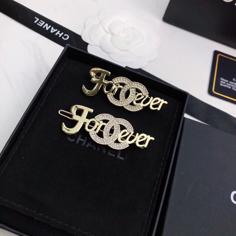 Ch*el brooches